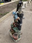A resin water pump with gnomes