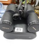 A cased pair of 10 x 50 Chinon binoculars.
