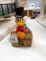 A vintage Disney Scrooge Mcduck Sheffield trustee savings bank TSB money box with key