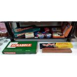 A quantity of games including Scrabbles & cribbage board
