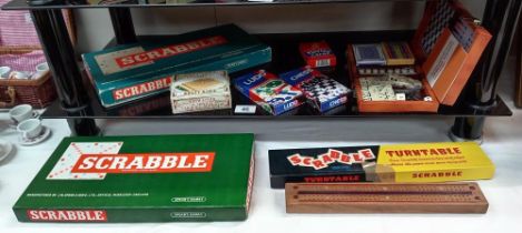 A quantity of games including Scrabbles & cribbage board