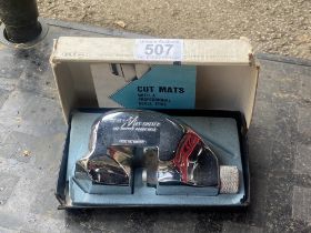 A boxed Dexter mat cutter