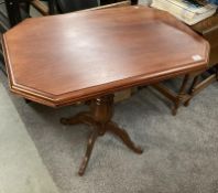 An octagonal mahogany occasional/hall table on turned pedestal. COLLECT ONLY