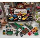 A quantity of boxed / unboxed diecast vehicles etc