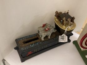 A novelty cast iron Noah's Ark money box