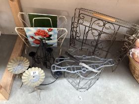 A good lot of metal items including Victorian style airer ends, candle holders & paper racks