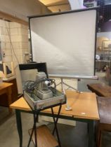 A vintage Aldis projector with stand & screen