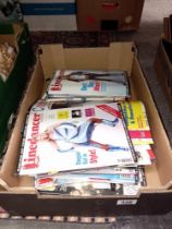 A box of country music & line dancing magazines