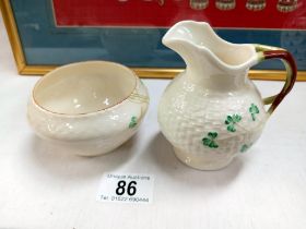 A Belleek milk jug & sugar bowl.