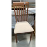 A set of four rail back modern dining chairs with padded seats. COLLECT ONLY