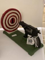 A novelty cast iron target money box.