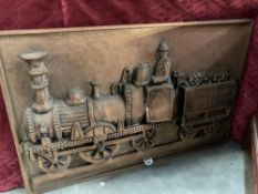 A large vacuum formed plastic sculpture of a steam train with a copper finish to surface 83 x 53cm