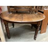 A late 19th early 20thc Mahogany dining table over turned and reeded legs COLLECT ONLY