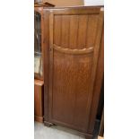 An Oak single hall gentlemen's wardrobe hanging space and shelf COLLECT ONLY