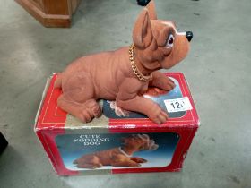 A vintage boxed nodding dog