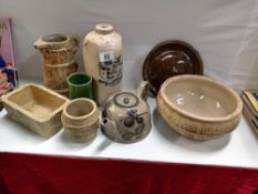 A quantity of pottery items