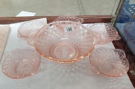 A set of 6 peach coloured vintage glass dishes