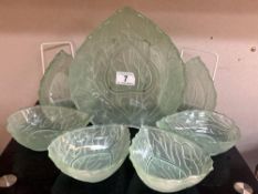 A lovely set of green vintage glass dessert bowls