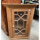 A Pine astragal glazed wall hanging/standing corner cupboard with scalloped shelves COLLECT ONLY