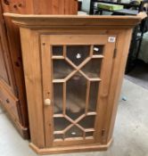 A Pine astragal glazed wall hanging/standing corner cupboard with scalloped shelves COLLECT ONLY