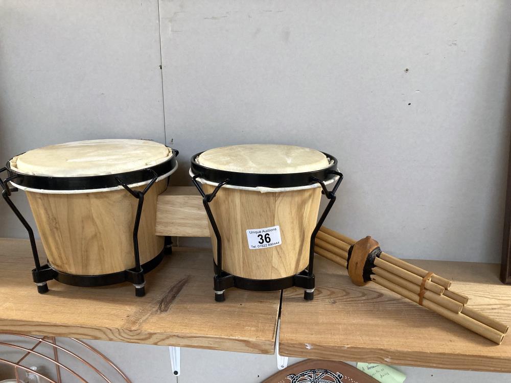 A pair of Tom Tom drums & African pan pipes