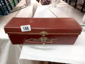 A small vintage case (May be a glove box)