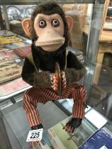 An early Japanese battery operated monkey
