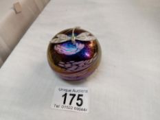 An irridescent paperweight by K. Heaton with silver dragon fly, signed. Height 4.5cm Diameter 6cm