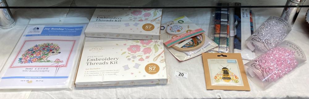 A quantity of cross stitch kits (new) and 2 lots of embroidery thread kits (new) etc