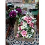 A box of artificial flowers