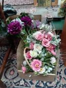 A box of artificial flowers