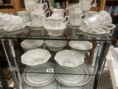 A quantity of eternal bow crockery tea & coffee cups etc & A quantity of Paragon dinnerware