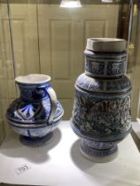 2 German embossed stoneware jugs