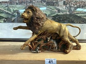 A handmade from the earth lion by Ann Richmond