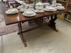 A strut & wedge dining table (167cm x 75cm x 76cm)