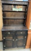 An Oak Ercol style dresser with plate rack 180h x 95 w x 49 d COLLECT ONLY