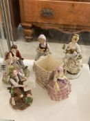 Five assorted porcelain figures.