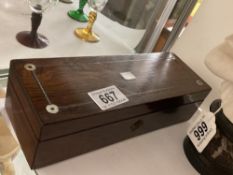 An early 20th century rosewood glove box.