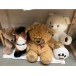 A collection of teddys and a horse