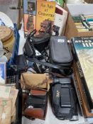 A selection of vintage cameras and books etc