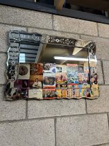 A decorative mirror with floral etched mirror frame 72 x 50cm