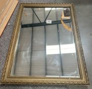 A gilt framed mirror. 66 x 47cm
