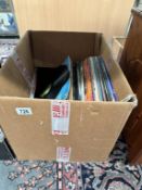 A box of LPs including The Hollies, Elvis etc