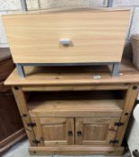 A Pine corner TV cabinet. 85 x 43m x 79cm