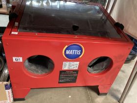 A Mattis sand blasting cabinet