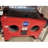 A Mattis sand blasting cabinet