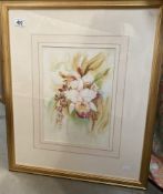 A gilt framed and glazed watercolour of an orchid