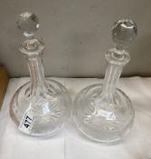 2 Cut glass decanters. 1 Stopper A/F