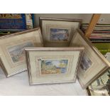 A set of 4 unusual style prints in silver coloured frames