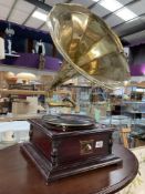A reproduction horn gramophone. Worked when tested.